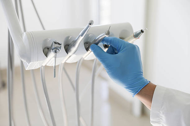 Professional Tooth Extraction technician working in Goldenrod, FL